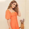Bohemianisches schickes orangefarbenes Kleid Boho-Chic